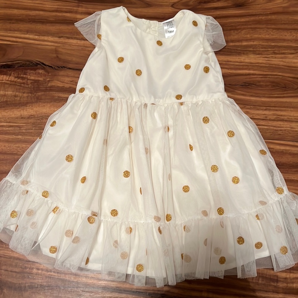 Cream dress with gold pok a dots. Size 18 months